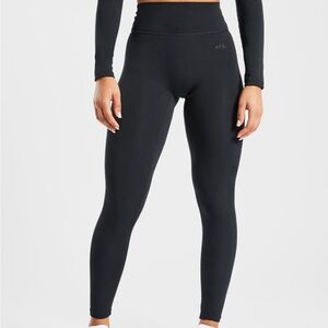 2 pairs of black aybl staple leggings XXL. never worn tags still on